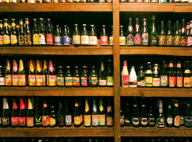 bottles with craft belgium beer, different sorts and many breweries in local bar for drinkers - business styles foods and drinks drinking imagens e fotografias de stock