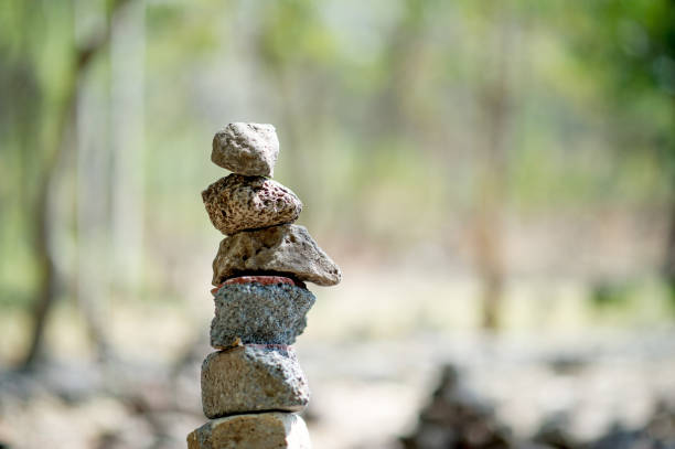 The stones that are laid against each other are like unity and teamwork.Team concept With copy space