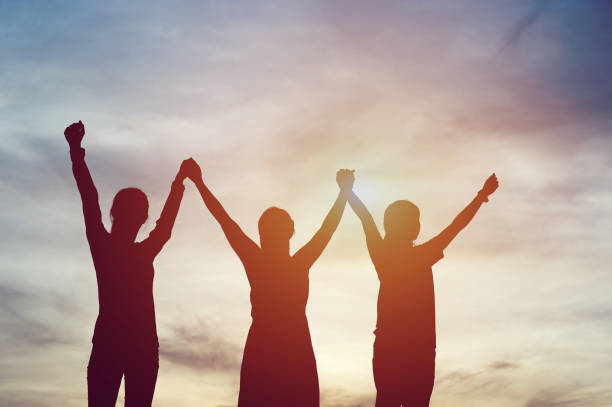 istock Silhouette of team leadership, teamwork and teamwork and delightful silhouette concepts 1146042433
