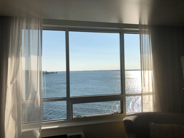 istock View through hotel window onto Lake Erie during summer sunset. 1146042496