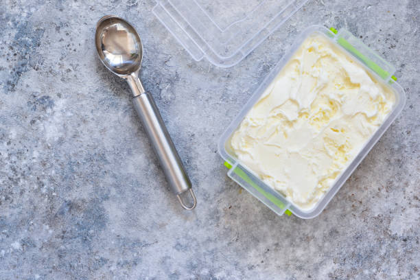 istock Vanilla, creamy ice cream on a concrete background. View from above. 1146044169