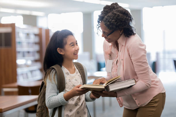 istock African American librarian inspires enthusiasm for learning 1146044355