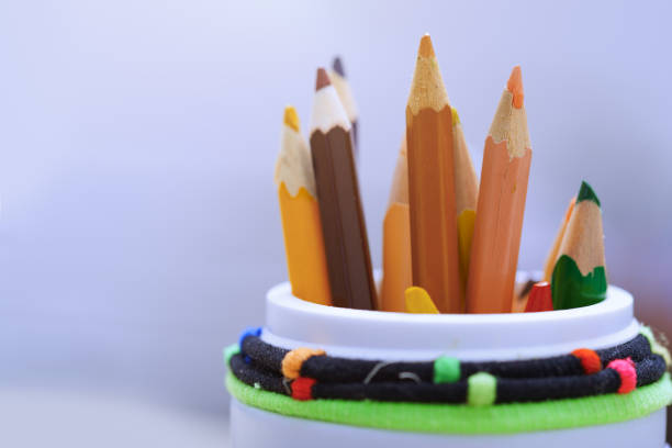 istock Color pencils in the plastic jar. Close-up 1146045701