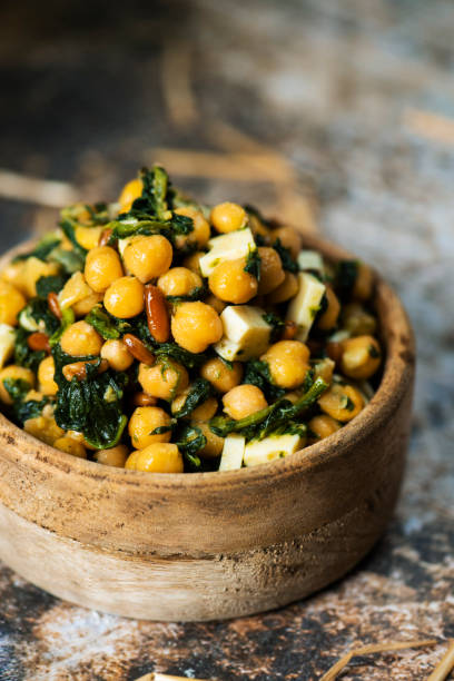 istock chickpea salad, with spinach, pine nuts and cheese 1146045797