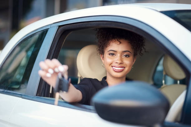 istock She's officially a car owner 1146046836