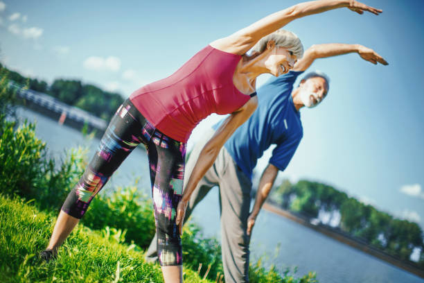 istock Yoga class outdoors. 1146047012