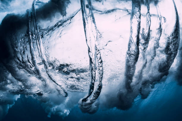 istock Barrel wave underwater with air bubbles. Ocean in underwater 1146049623