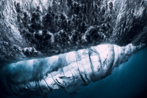 istock Barrel wave underwater with air bubbles. Ocean in underwater 1146049744