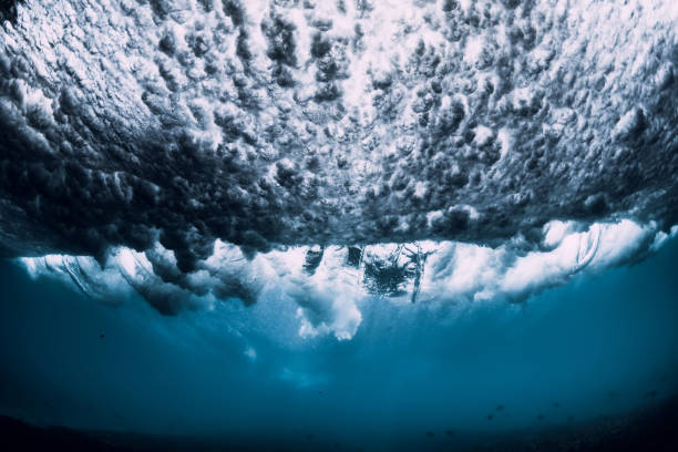 istock Barrel wave underwater with air bubbles. Ocean in underwater 1146050396