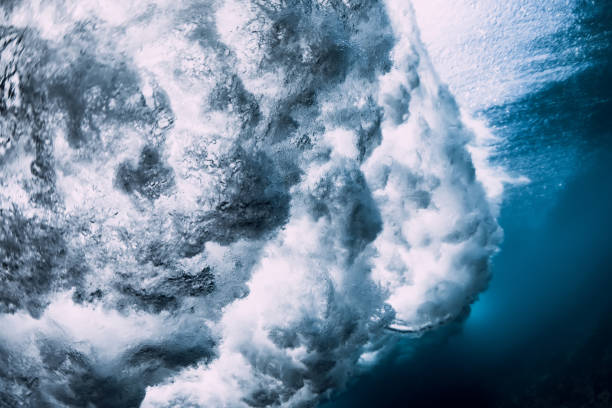 istock Barrel wave underwater with air bubbles. Ocean in underwater 1146051052