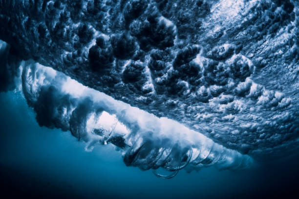 istock Barrel wave underwater with air bubbles. Ocean in underwater 1146052767
