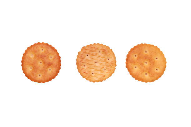 istock Close up of round crackers on white background. 1146058947