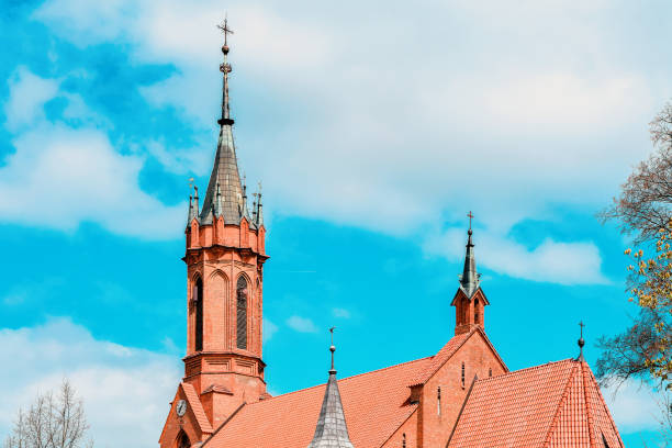 Vilnius, Lithuania. Roman Catholic Church Of St. Anne And Church Of St. Francis And St. Bernard In Old Town In Summer Sunny Day. UNESCO World Heritage.