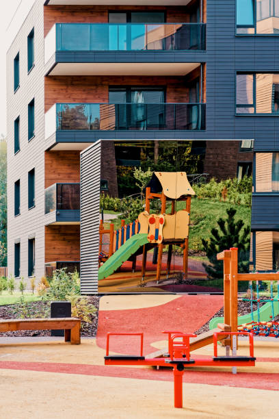 istock Children playing ground at architectural complex of apartment buildings 1146065253