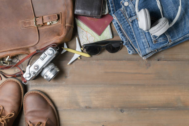 istock prepare backpack accessories and travel items on wood 1146067130