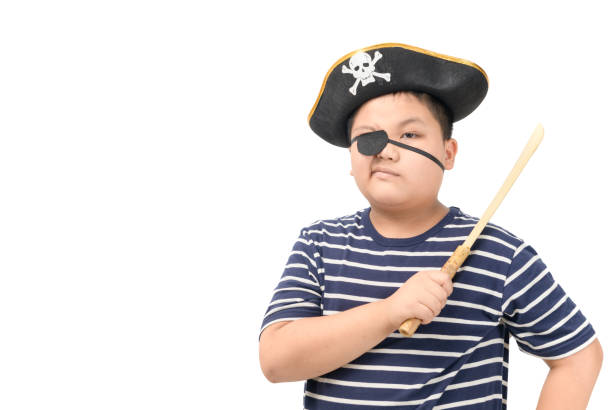 istock Kid pirate holding wood sword isolated 1146067165