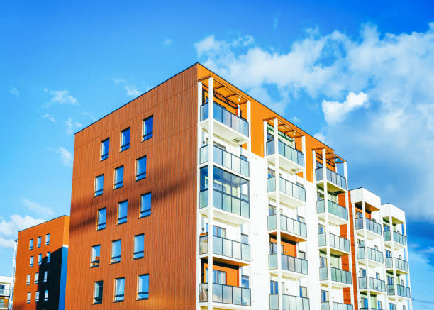 istock Modern new apartment house copy space blue sky clouds 1146068626