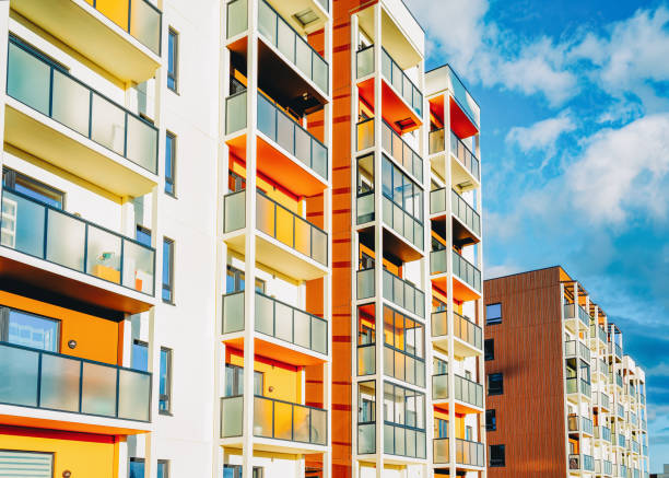 istock Facade of modern apartment house copy space blue sky clouds 1146068767