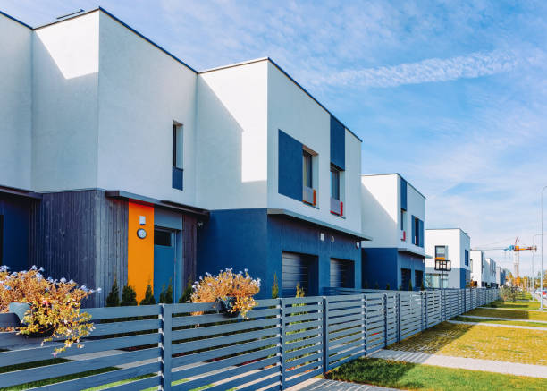 istock Apartment house and home residential building complex with gate 1146069162