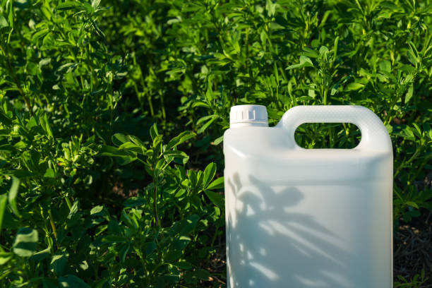 istock Pesticide jug mock up in clover field 1146069426