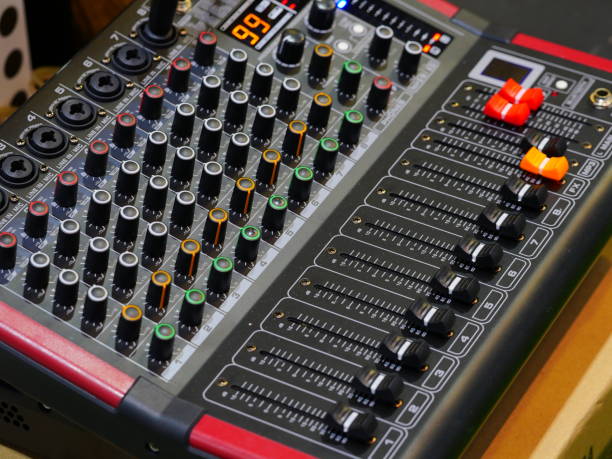Side closeup on a sliders of a mixing console Radio Station, Recording Studio, Radio, Audio Equipment, Television Studio home recording studio setup stock pictures, royalty-free photos & images