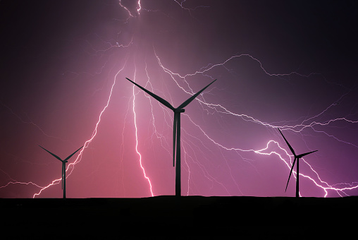 wind turbines in a lightning storm