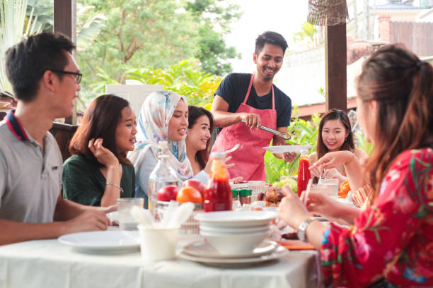 istock A Group of People Dining At a Barbecue Party 1146074857