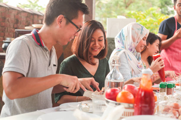 istock A Group of Young Adults at a Dining Table 1146074873