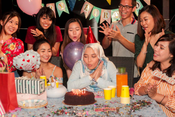 istock A Group of Young Adults Singing Birthday Song 1146074901