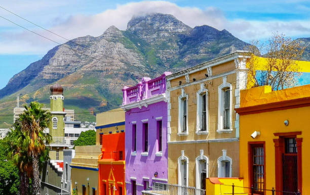 Cape town Bo Kaap Malay quarter rooftops with table mountain in the background, featuring the typical colorful houses.