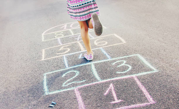 istock street children's games in classics. Selective focus. 1146077155
