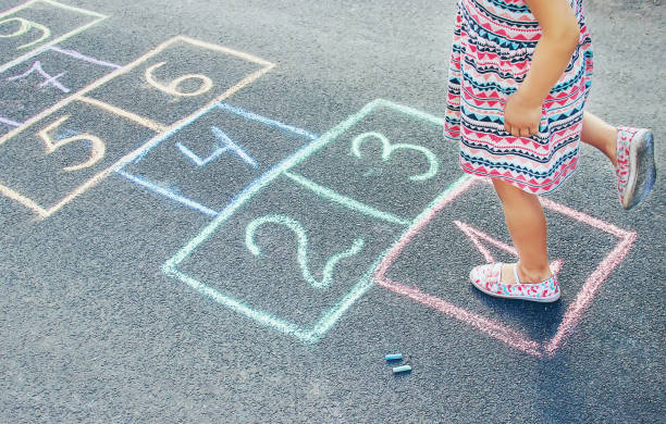 istock street children's games in classics. Selective focus. 1146077161