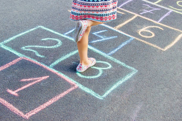 istock street children's games in classics. Selective focus. 1146077189