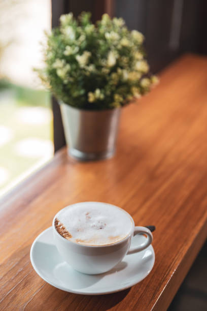 istock cappuccino hot coffee at the window 1146080330