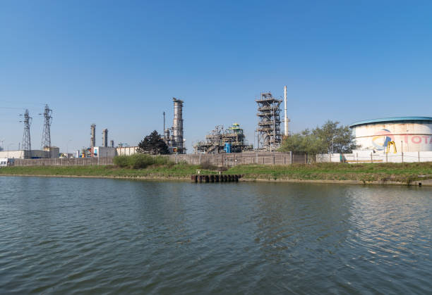 View of the old oil refinery Total in Dunkirk. Dunkirk,FRANCE-April 20,2019: view of the old oil refinery Total in Dunkirk, currently transformed into BIO fuel production.Total it is French oil and gas company. total amount stock pictures, royalty-free photos & images