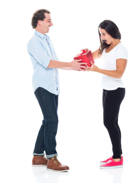 istock Husband giving a gift to his wife 1146084599
