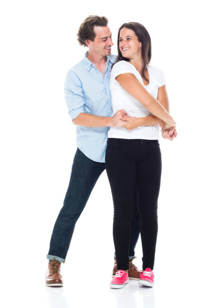 istock Attractive couple are happily dancing 1146086150