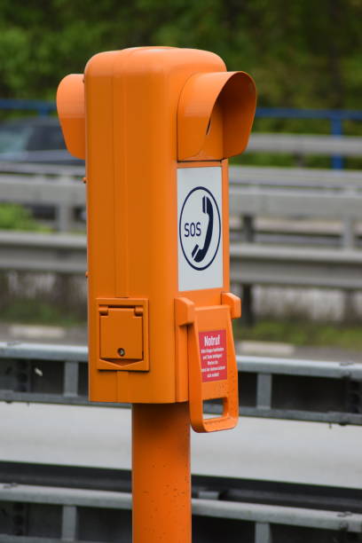 istock orange emergency phone column on Autobahn 1146086200