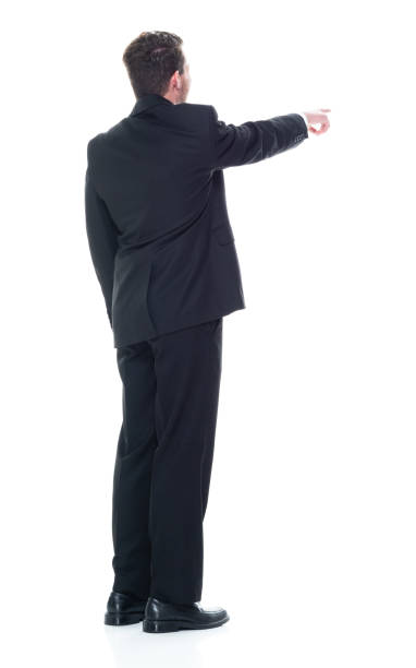 istock Young handsome businessman wearing a suit and tie - pointing 1146087359
