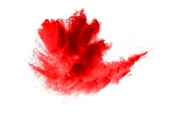 istock Freeze motion of red powder exploding, isolated on white background. Abstract design of red dust cloud. Particles explosion screen saver, wallpaper 1146088739