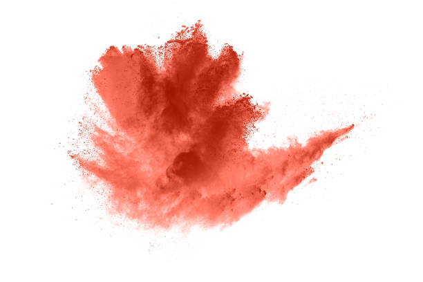 istock living coral color powder explosion on white background. Colored cloud. Colorful dust explode. Paint Holi. 1146088776