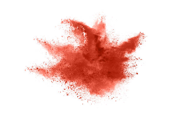 istock living coral color powder explosion on white background. Colored cloud. Colorful dust explode. Paint Holi. 1146088778