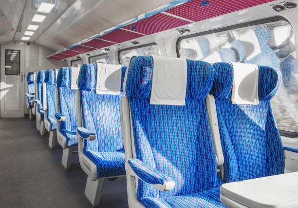 istock Interior of european first class passenger train with empty seats. 1146090112
