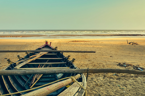 Shankarpur sea beach, West Bengal. Shot of a boat near fishing village.
