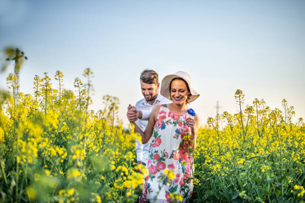 istock Happy young couple in the nature 1146091315
