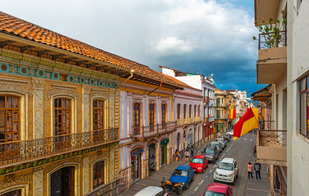 Cuenca at Sunset, Ecuador Sunset in the city center of Cuenca with its colonial style facades and a thunder storm on the way, Ecuador. cuenca ecuador stock pictures, royalty-free photos & images
