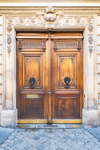 istock Paris, wooden door 1146093051