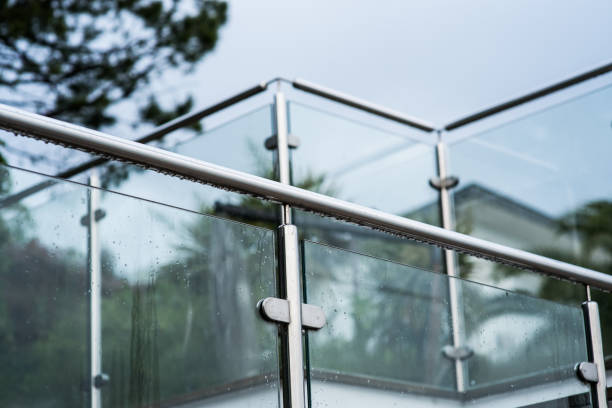 Metal railings and glass wall Metal railings and glass wall outdoor balustrade stock pictures, royalty-free photos & images