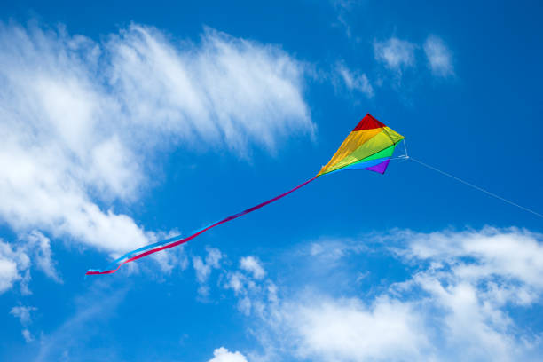 istock Kite flying in the sky among the clouds 1146096818