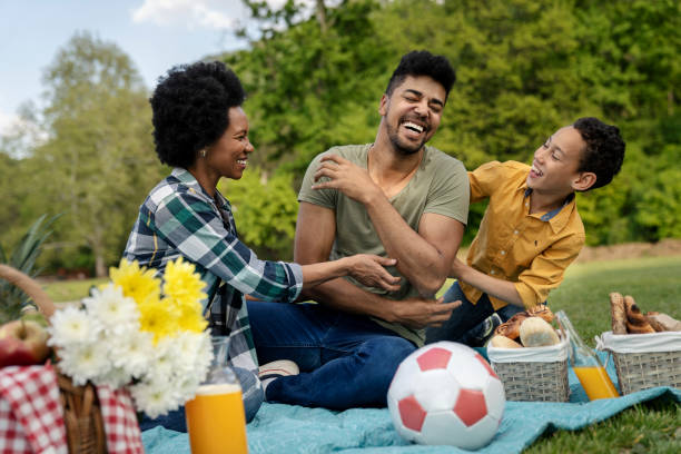 istock Happy family spending a spring day on picnic 1146097540